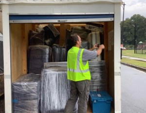 A mover moving items into a truck