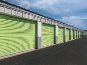 A row of self storage doors in Extra Space Colors
