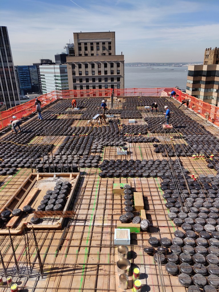 The use of voided concrete allowed for additional floors at One Wall Street. Image courtesy of DeSimone Consulting Engineers