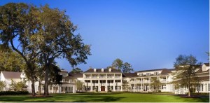 Montage Palmetto Bluff, a sprawling white property with balconies and a green lawn, in South Carolina.
