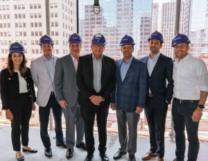 Seven officials in hardhats