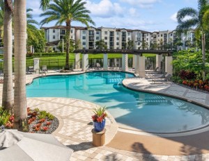 Outdoor pool surrounded by apartments