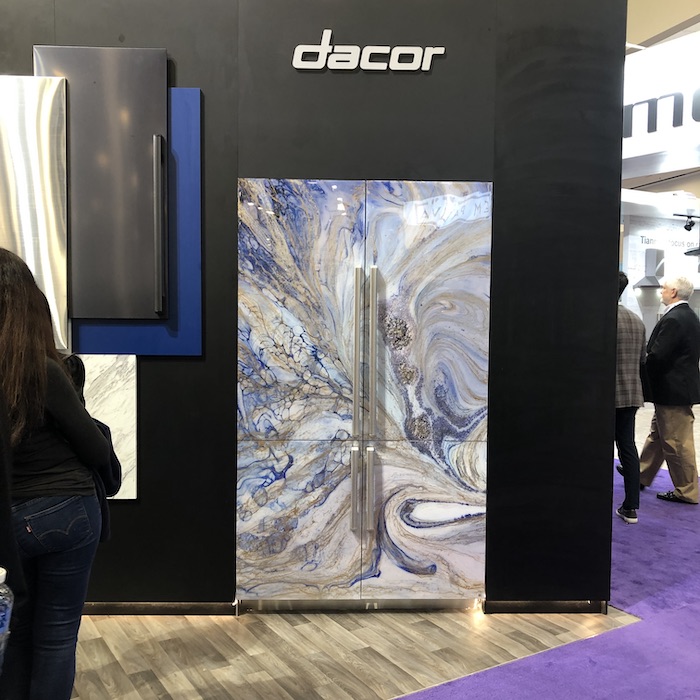 A twin-door refrigerator with a marble-like design