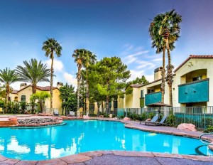 Pool and palm trees near the apartments