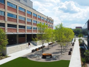 Exterior of Navy Yard property and a courtyard with trees and seating