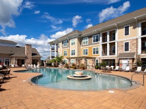 Exterior of apartments with pool and amenities