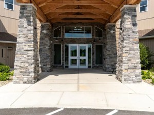 Exterior shot of Riverview Apartment's entrance. The affordable community is in Corinth, N.Y.