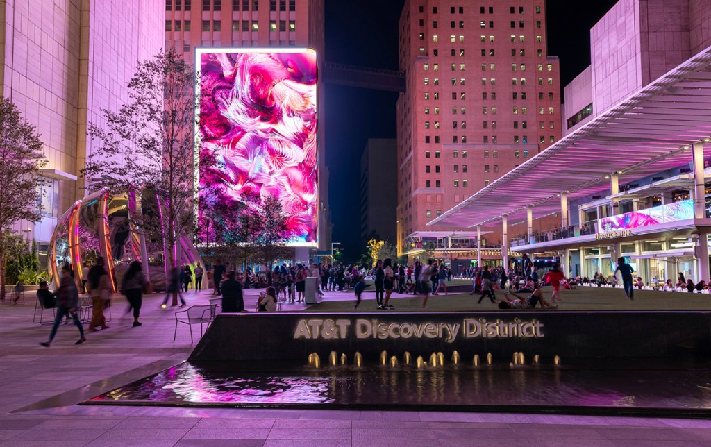 The creation of the AT&T Discovery District in downtown Dallas transformed the AT&T headquarters into a mixed-use destination. The urban campus includes retail, dining and offices and provides free public Wi-Fi. Photo by Grant Gray, image courtesy of Gensler