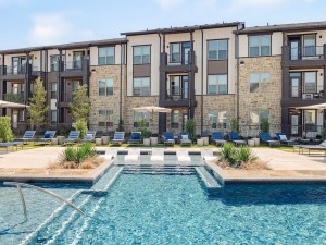 Exterior shot including the swimming pool of The Starling, a multifamily community in Princeton, Texas