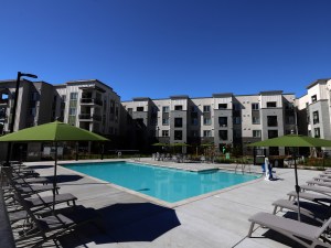 Exterior shot of College Creek's swimming pool. The 164-unit affordable community is located in Santa Rosa, Calif.