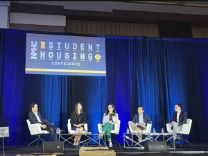 A panel of student housing investors moderated by Teddy Leatherman, managing director at JLL Capital Markets. Participants include Evan Baum of Ares Management Corp., Darren Chan at QuadReal Property Group, APG’s Estella Jin and University Partners’ Bryan Kam. Photo by Gabriel Frank