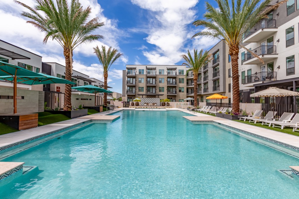 Exterior shot of the shared pool area at Novel Val Vista property in Phoenix.