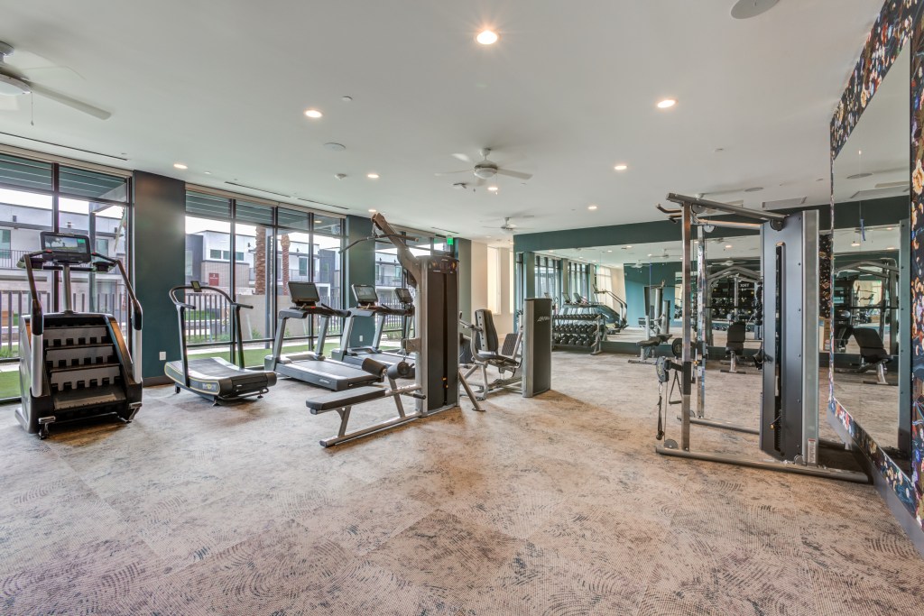 Interior shot of the fitness center at Novel Val Vista in Phoenix.