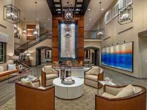 Interior shot of Ocean Hills seniors community in Oceanside, Calif. The lounge features a sitting area.
