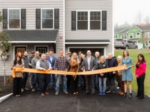 Ribbon cutting ceremony in honor of the grand opening of Saddle Rock, a 64-townhouse community in Manchester, N.H.