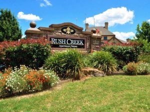 Exterior shot of the entrance at Rush Creek, a 248-unit affordable housing asset in Arlington, Texas.