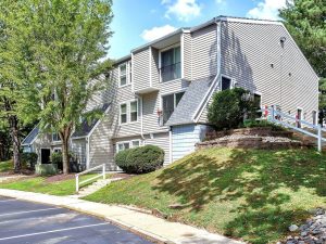 Exterior shot of Woods of Williamsburg, a 125-unit community in Williamsburg, Va.
