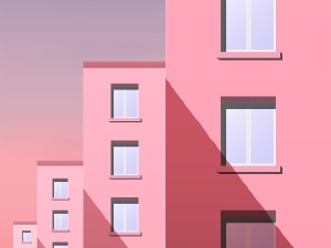 Day city landscape. Part of the street with a number of new panel houses in pink tones against the Sunny sky.