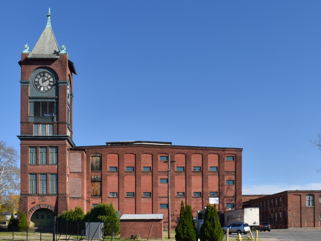Exterior shot of the mill at 50 State St. before it turned into Residences at Mill 8, a partially affordable senior community in Ludlow, Mass.