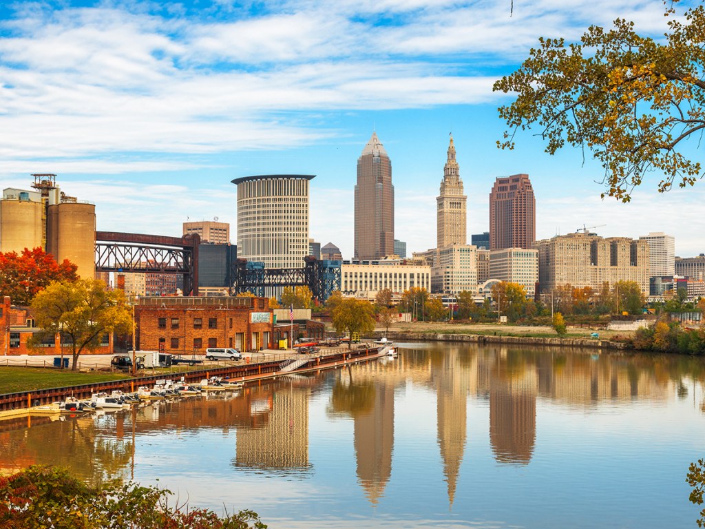 Cleveland, Ohio, USA skyline on the Cuyahoga River in autumn.
