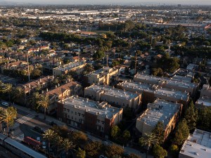 Fullerton, California, USA. Sunset light shines on dense housing in downtown Fullerton.