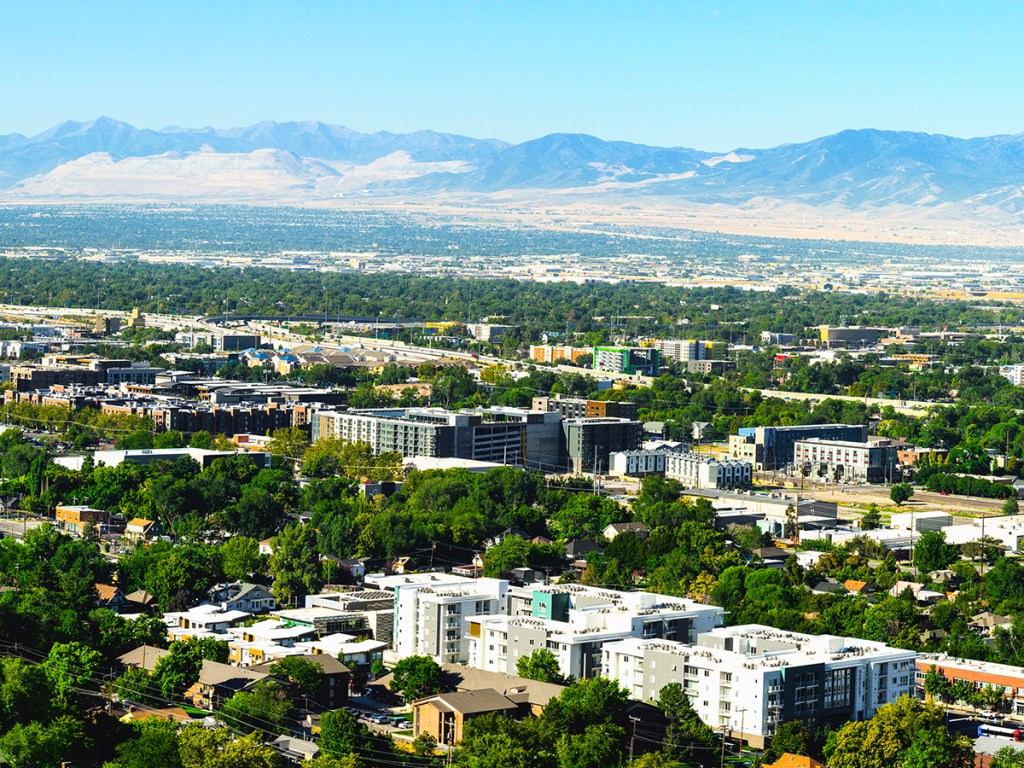 Salt Lake City Sunrise Skyline, Skyscrapers, and Buildings in Utah, USA: A tranquil metropolitan modern cityscape of The Crossroads of the West on a summer morning
