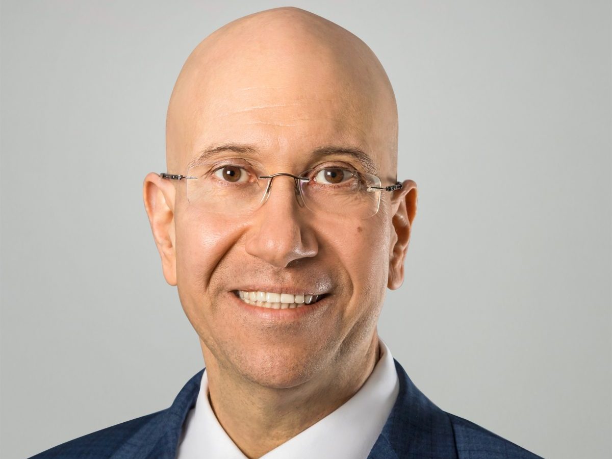 Headshot of Shimon Shkury, Founder & President of Ariel Property Advisors