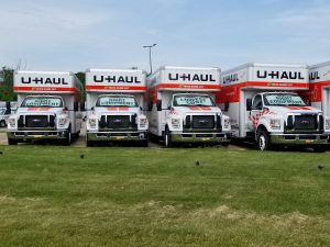 Shot of U-Haul equipment, moving trucks.