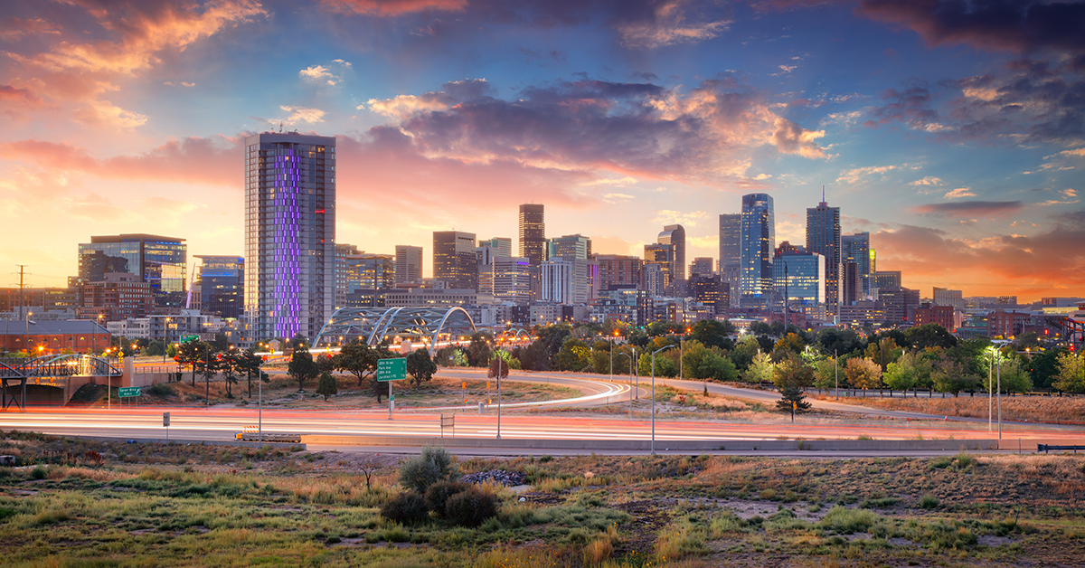 Cityscape image of Denver skyline, Colorado, USA at dramatic summer sunrise.