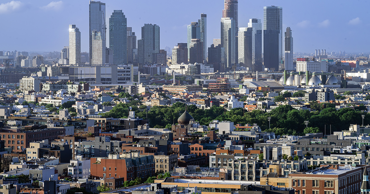 July 10, 2024, New York, NY, USA: View Across Williamsburg and Greenpoint to Long Island City in Queens, New York from Williamsburg, Brooklyn on a hot July afternoon. McCarren Park can be seen in the middle of the frame.