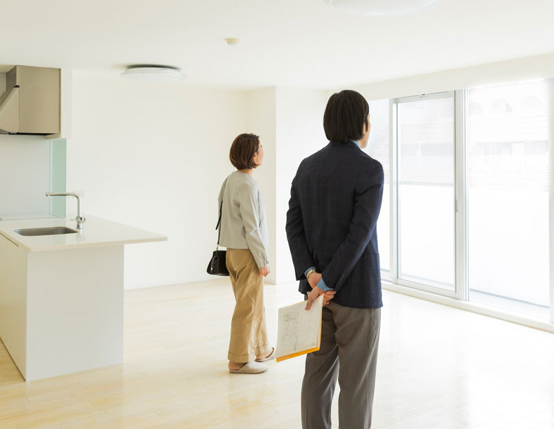 People touring an apartment.