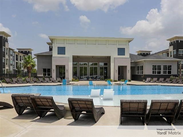 Pool-side photo at Vista at Southwinds, a 265-unit community in Baytown, Texas.