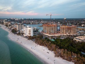 Aerial photo of The Ritz-Carlton Residences in Naples, a five-building condominium complex that topped off in Naples, Fla.