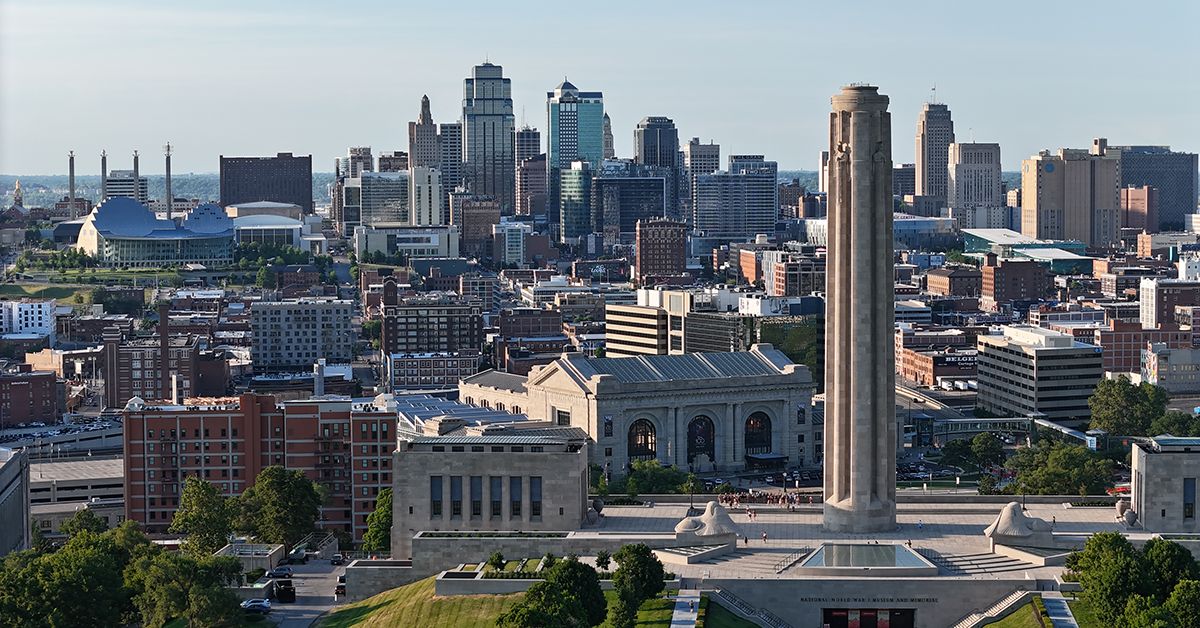 Aerial view of National WWI Museum and Memorial with downtown Kansas City, Missouri skyline during summer