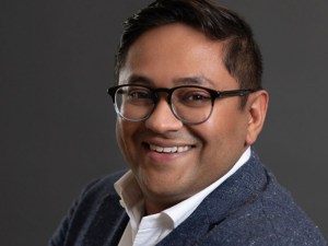Headshot of The Michaels Organization Director of Acquisitions Mohsin Azmi.