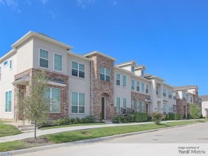 Exterior shot of The Residences as Rayzor Ranch, a BTR community developed by Wan Bridge about 17 miles from Frontera Shores Townhomes.