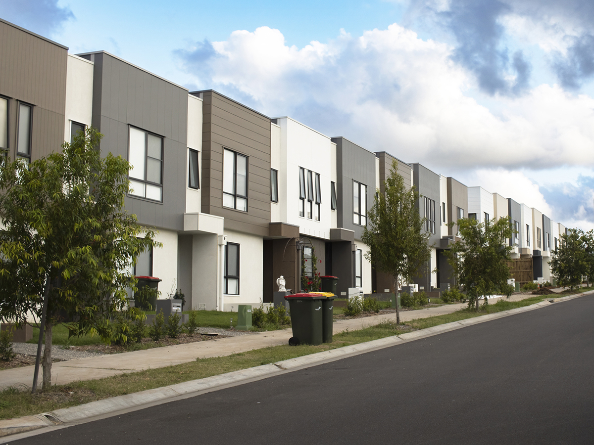 Modern residential townhouses homes in Queensland Australia. Real estate housing development and property market. Homeownership Conceptual photo