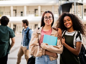 Portrait of young students friends women outdoors