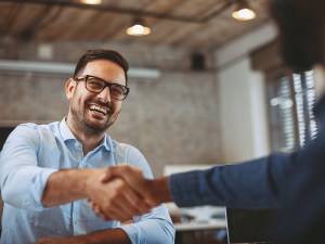 Close up of handshake in the office
