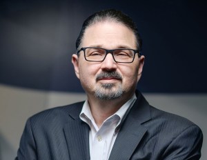 Headshot of Andy Gutman of Campusville