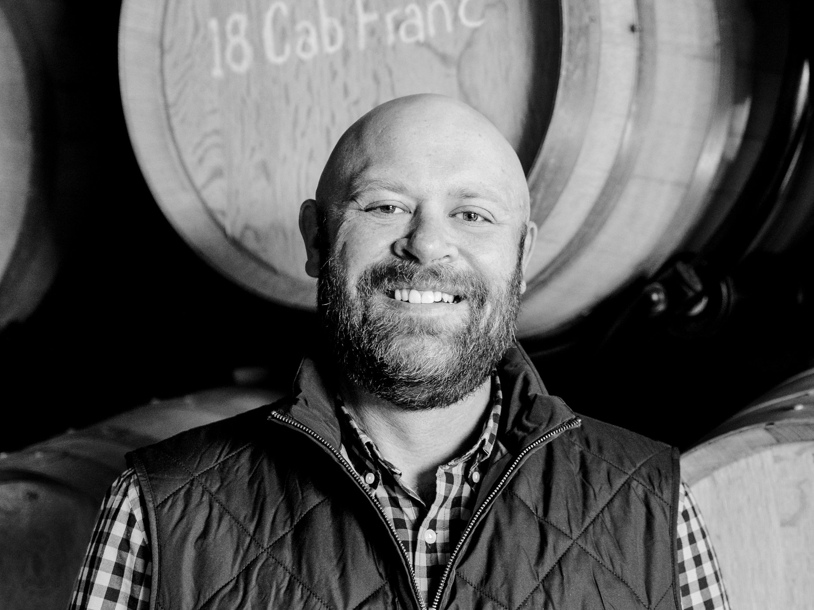 black&white headshot of DXD Capital Managing Director David Bailey