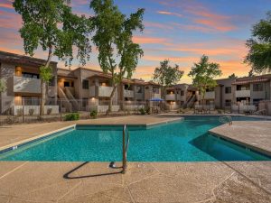 Pool-side shot of Country Brook Apartments, a 32-building, 396-unit garden-style luxury community in Chandler, Ariz.