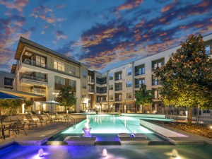 Exterior shot featuring The Alden at Cedar Park's amenity package, including its swimming pool.
