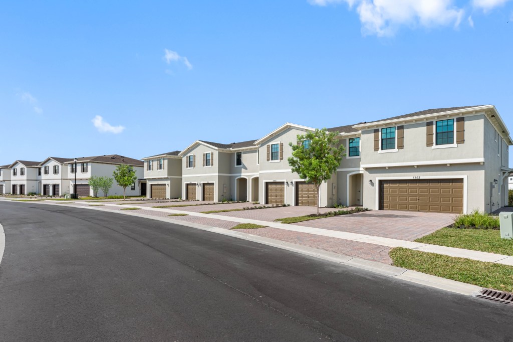 A street-level view of townhomes in the Villas of Torino community.