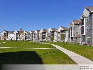 Exterior shot depicting Cypress Court, a multifamily community in St. Cloud, Minn., that Centerspace sold in a portfolio deal of $124 million.