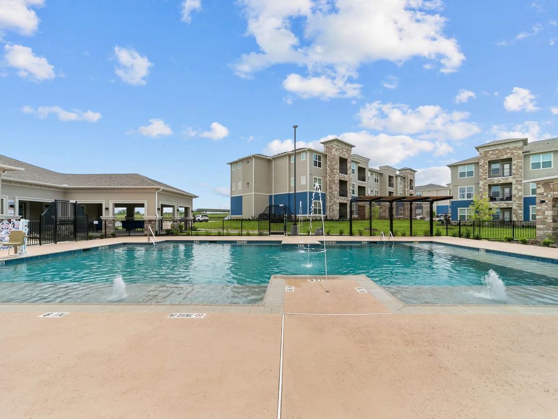 Pool-side shot of Cross Timber Apartments, a 216-unit community in Greenville, Texas.