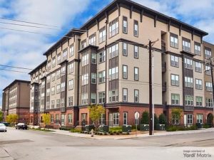 Exterior shot of The Fairmount at Oak Lawn, a multifamily building in Dallas.