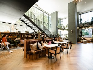 The lobby’s open concept allows guests and community members to network and lounge in a unique way
