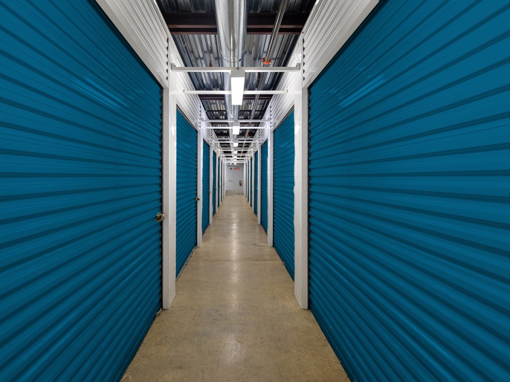 Interior photo of a hallway inside a self storage facility.