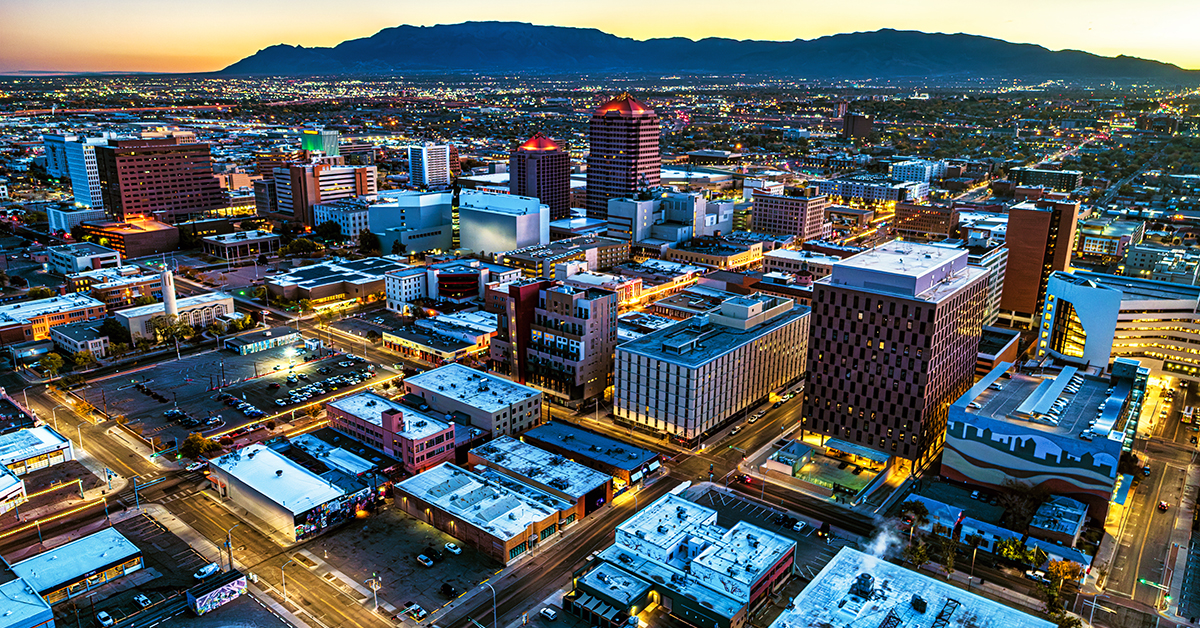Downtown Albuquerque aerial at dawn with the Sandia Mountains in the background.  Image can be used as a dusk shot.